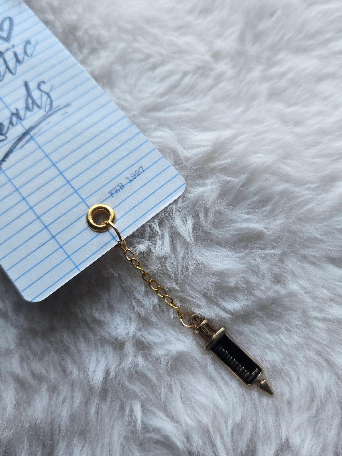 This T2D Reads Blue Library Card Bookmark