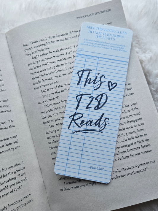 This T2D Reads Blue Library Card Bookmark